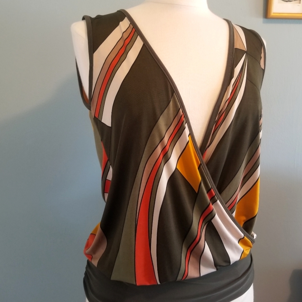 Deep v-neck front & back. Elegant, 70's colors, geometric pattern, size medium